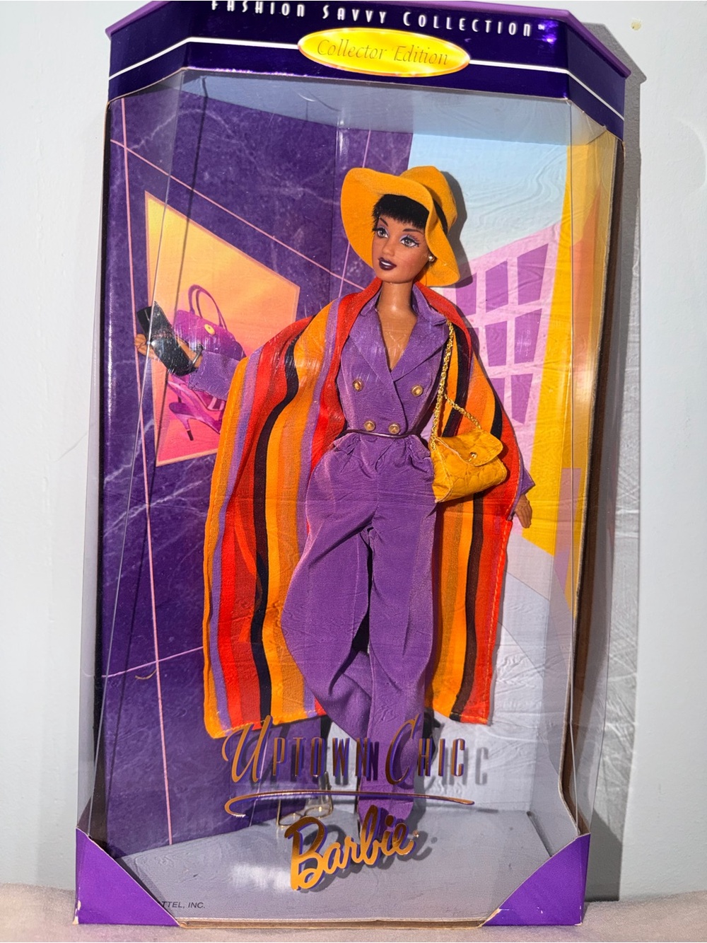 Barbie Purple Packaging with Orange, Red and Yellow Accents